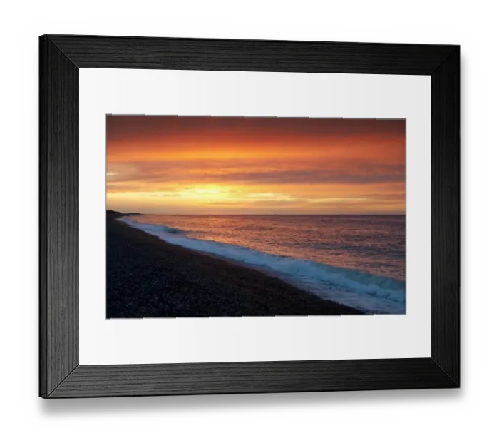 Framed Print : View of shingle beach and sea at sunset, Weybourne, Norfolk, England, august Framed Print : View of shingle beach and sea at sunset, Weybourne, Norfolk, England, august
