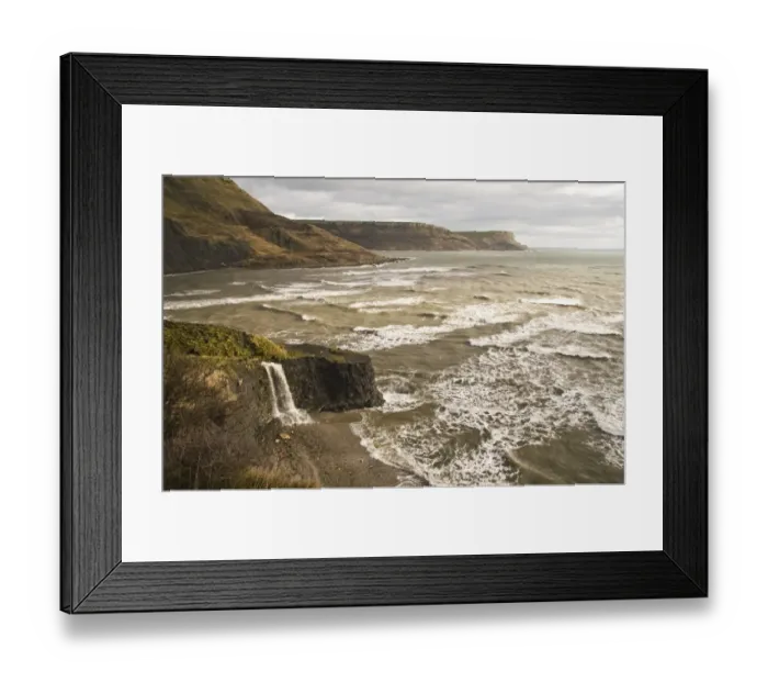 Framed Print : View of coastline with waterfall flowing over hard shale to beach on coast with rough sea, Freshwater Steps, Dorset Framed Print : View of coastline with waterfall flowing over hard shale to beach on coast with rough sea, Freshwater Steps, Dorset