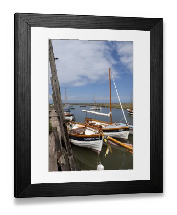 Framed Print : Moored sailing boats in coastal creek, Blakeney Quay, Norfolk, England, july Framed Print : Moored sailing boats in coastal creek, Blakeney Quay, Norfolk, England, july