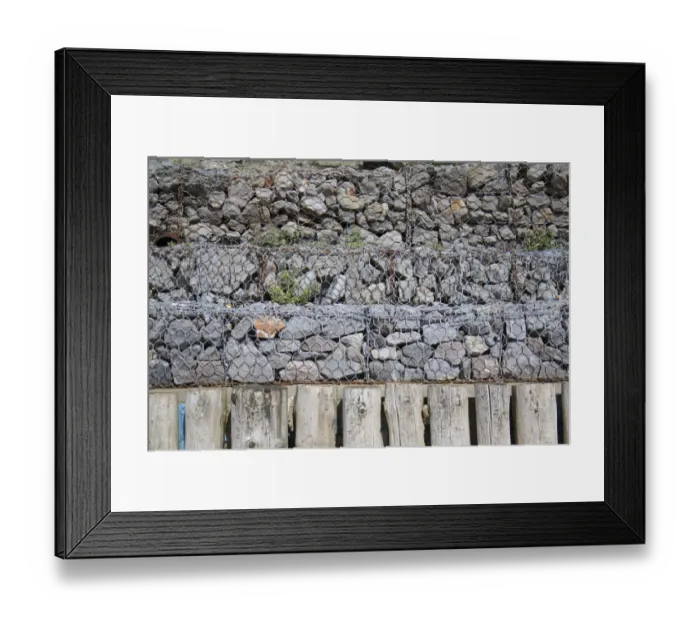 Framed Print : Rock filled gabions used as coastal erosion defence at base of sea cliffs, Whitecliff Bay, Isle of Wight, England, june Framed Print : Rock filled gabions used as coastal erosion defence at base of sea cliffs, Whitecliff Bay, Isle of Wight, England, june