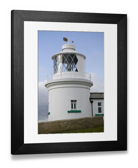 Framed Print : White painted lighthouse on coast, Anvil Point Lighthouse, Durlston, Isle of Purbeck, Dorset, England, january
