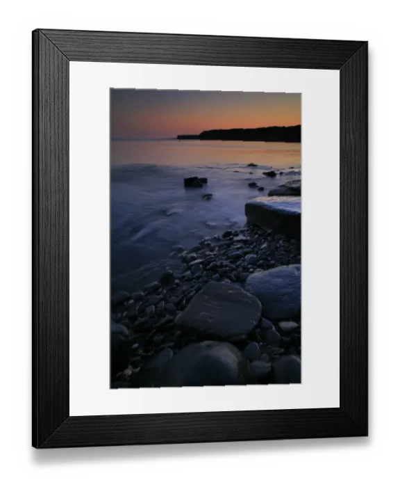 Framed Print : View of rocky beach with afterglow at sunset, Kimmeridge Bay, Isle of Purbeck, Dorset, England, july Framed Print : View of rocky beach with afterglow at sunset, Kimmeridge Bay, Isle of Purbeck, Dorset, England, july