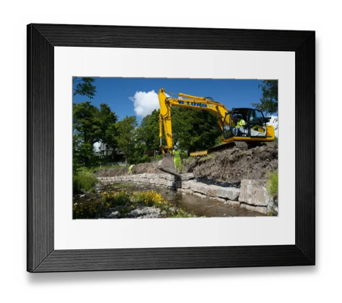 Framed Print : Excavator improving stream bank to help prevent flooding, Cumbria, England, june