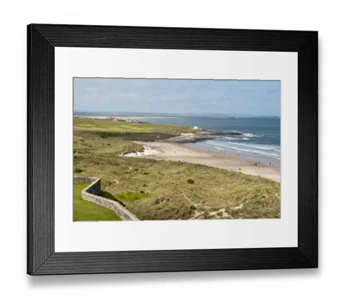 Framed Print : View of coastline with sand dunes and beach, Bamburgh, Northumberland, England, july Framed Print : View of coastline with sand dunes and beach, Bamburgh, Northumberland, England, july