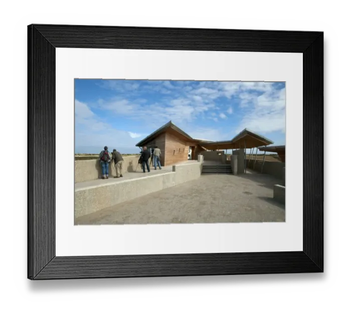 Framed Print : Birdwatchers standing beside new hides and information centre in coastal wetland reserve, Titchwell RSPB Reserve