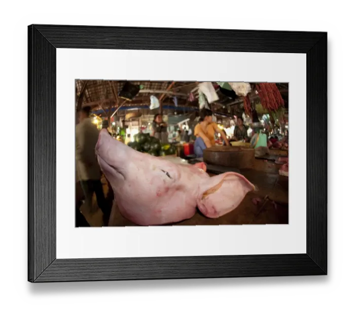 Framed Print : Butchers with pig head for sale in indoor market, Siem Riep, Cambodia Framed Print : Butchers with pig head for sale in indoor market, Siem Riep, Cambodia