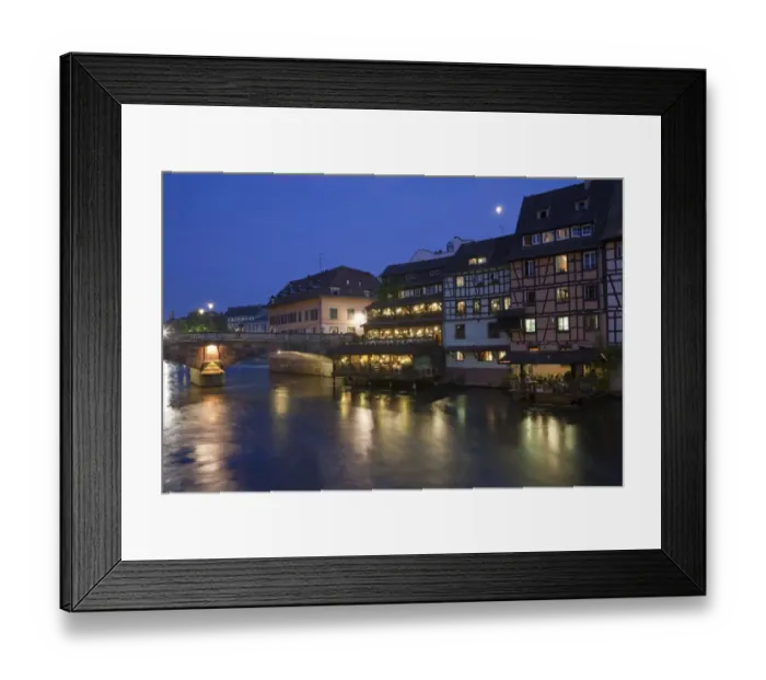 Framed Print : View of old town with timber-framed buildings, bridge and canal at night, Strasbourg, Alsace, France, july Framed Print : View of old town with timber-framed buildings, bridge and canal at night, Strasbourg, Alsace, France, july