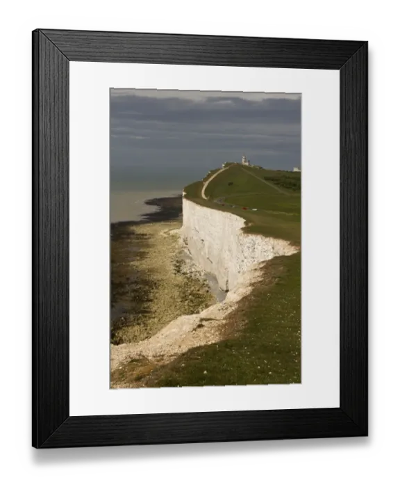 Framed Print : Beachy Head looking west over the old Belle Tout Lighthouse. This is a chalk headland on the south coast of England