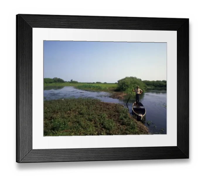 Framed Print : Europe - Poland Man on boat  /  Narew River  /  Biebrza Marshes