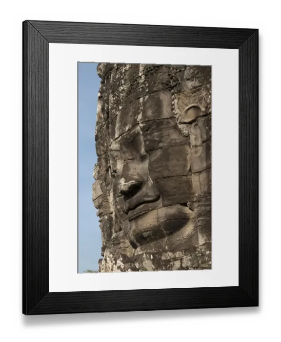 Framed Print : Large sculpture of head on tower of Khmer temple, Bayon, Angkor Thom, Siem Riep, Cambodia