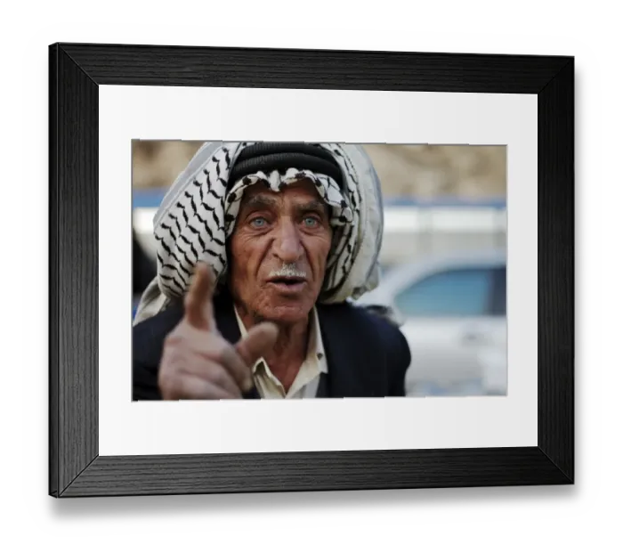 Framed Print : Market vendor, man talking, close-up of head, Amman, Jordan, november