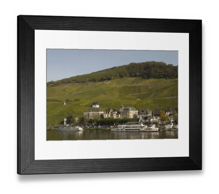 Framed Print : View of tourist boats on river, town and vineyard on hillside, River Mosel, Bernkastel, Rhineland-Palatinate, Germany Framed Print : View of tourist boats on river, town and vineyard on hillside, River Mosel, Bernkastel, Rhineland-Palatinate, Germany