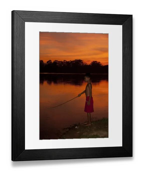 Framed Print : Boy fishing in lake at sunset, Pre Rup, Angkor, Siem Riep, Cambodia