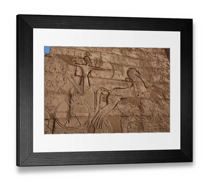 Framed Print : Relief showing Ramesses II on chariot slaying enemies, The Ramesseum (Mortuary Temple of Pharaoh Ramesses II) Framed Print : Relief showing Ramesses II on chariot slaying enemies, The Ramesseum (Mortuary Temple of Pharaoh Ramesses II)