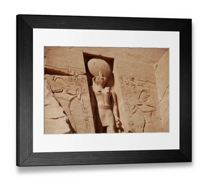 Framed Print : Statue of falcon-headed sun god Ra-Horakhty decorating facade of temple, The Great Temple, Abu Simbel, Nubia, Egypt Framed Print : Statue of falcon-headed sun god Ra-Horakhty decorating facade of temple, The Great Temple, Abu Simbel, Nubia, Egypt