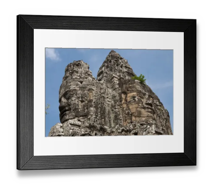 Framed Print : Top of major gate tower with large sculptures of heads, at Khmer temple, Angkor Thom, Siem Riep, Cambodia Framed Print : Top of major gate tower with large sculptures of heads, at Khmer temple, Angkor Thom, Siem Riep, Cambodia