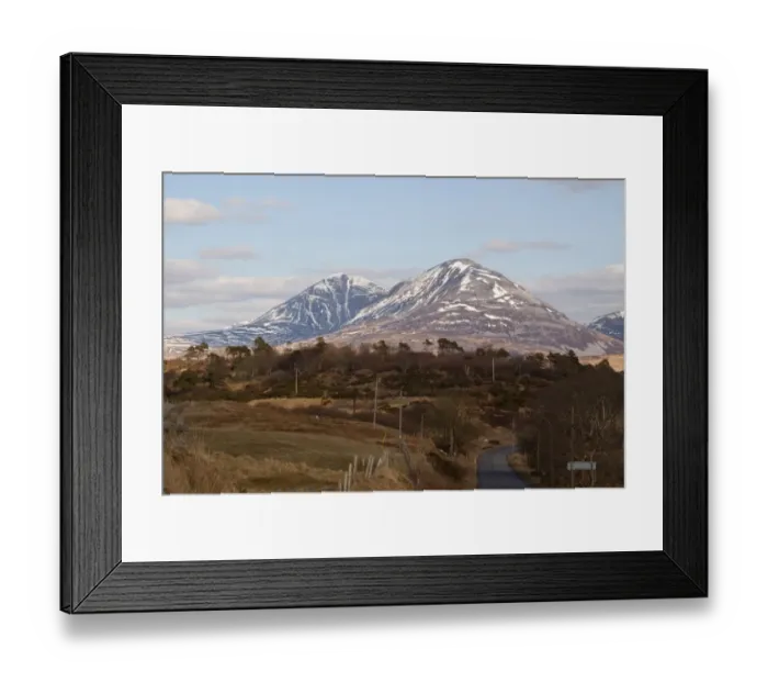 Framed Print : The snow covered Paps of Jura viewed from the Port Askaig road on Islay Framed Print : The snow covered Paps of Jura viewed from the Port Askaig road on Islay