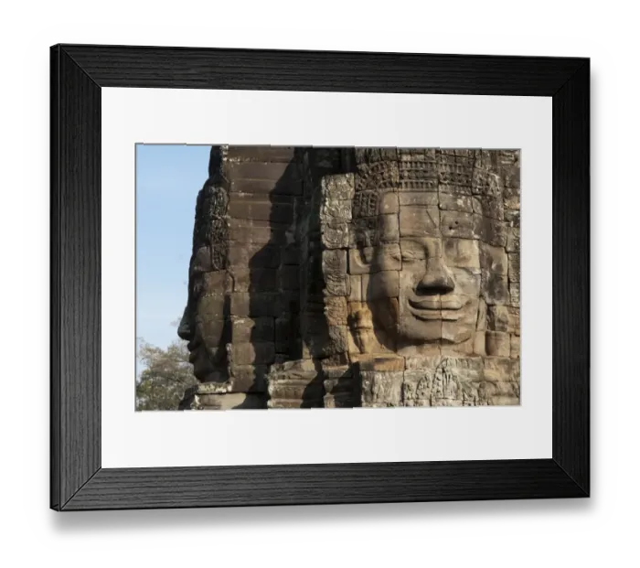 Framed Print : Large sculptures of heads on tower of Khmer temple, Bayon, Angkor Thom, Siem Riep, Cambodia