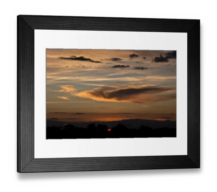 Framed Print : Evening sky in the Okavango Delta, with some cumulus and cirrus clouds