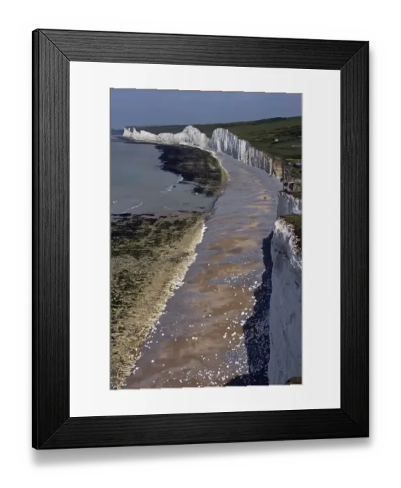Framed Print : Beachy Head looking west over Birling Gap. This is a chalk headland on the south coast of England Framed Print : Beachy Head looking west over Birling Gap. This is a chalk headland on the south coast of England