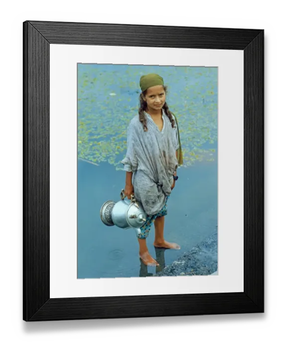 Framed Print : Kashmiri girl, standing in water holding vessel, Dal Lake, Srinagar, Kashmir, India Framed Print : Kashmiri girl, standing in water holding vessel, Dal Lake, Srinagar, Kashmir, India