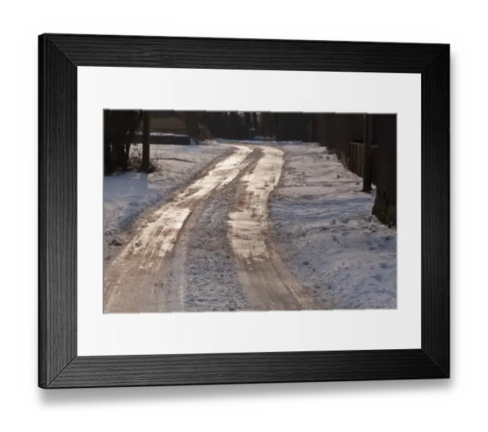 Framed Print : Ice on road from melted snow Framed Print : Ice on road from melted snow