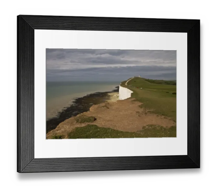 Framed Print : Erosion on chalk downland sea cliffs at Beachy Head looking towards Belle Tout lighthouse Framed Print : Erosion on chalk downland sea cliffs at Beachy Head looking towards Belle Tout lighthouse
