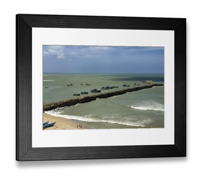 Framed Print : View of breakwater with moored fishing boats, confluence of Indian Ocean, Arabian Sea and Bay of Bengal Framed Print : View of breakwater with moored fishing boats, confluence of Indian Ocean, Arabian Sea and Bay of Bengal