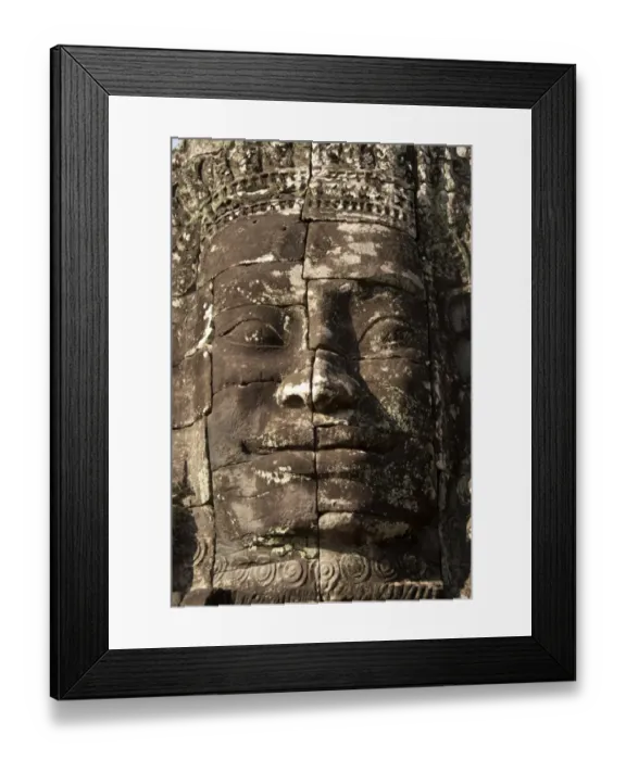 Framed Print : Large sculpture of head in Khmer temple, Bayon, Angkor Thom, Siem Riep, Cambodia Framed Print : Large sculpture of head in Khmer temple, Bayon, Angkor Thom, Siem Riep, Cambodia