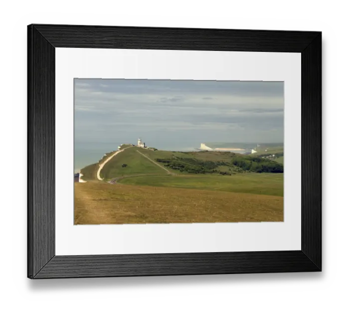 Framed Print : Beachy Head looking west over the old Belle Tout lingthouse. This is a chalk headland on the south coast of England Framed Print : Beachy Head looking west over the old Belle Tout lingthouse. This is a chalk headland on the south coast of England