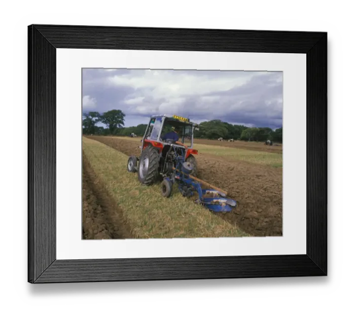 Framed Print : Tractor ploughing stubble field during ploughing competition, Wales Framed Print : Tractor ploughing stubble field during ploughing competition, Wales