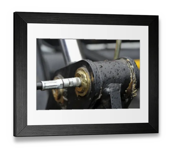 Framed Print : Grease nipple points on loader tractor, with grease being added, England, october Framed Print : Grease nipple points on loader tractor, with grease being added, England, october