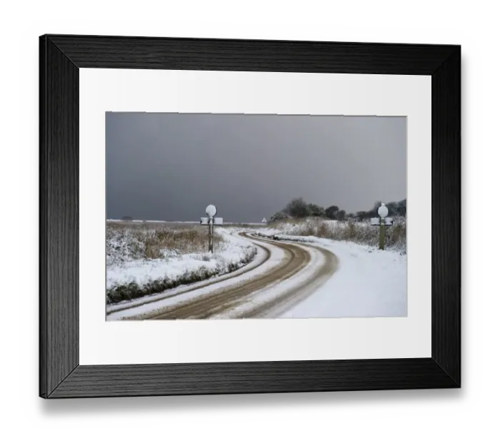 Framed Print : Snow covered A149 coast road, Cley Marshes Reserve, Cley, Norfolk, England, december Framed Print : Snow covered A149 coast road, Cley Marshes Reserve, Cley, Norfolk, England, december