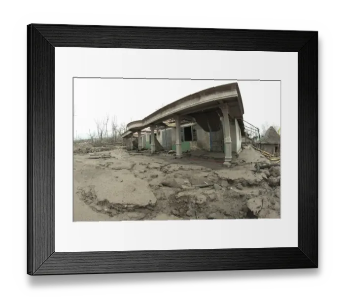 Framed Print : Road covered in ash, dead trees and damaged houses, from recent volcanic eruption, Kepuharjo, Mount Merapi