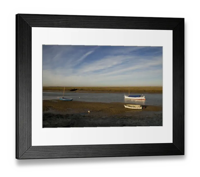 Framed Print : View of boats moored in coastal creek at low tide, Burnham Overy Staithe, Norfolk, England, december Framed Print : View of boats moored in coastal creek at low tide, Burnham Overy Staithe, Norfolk, England, december