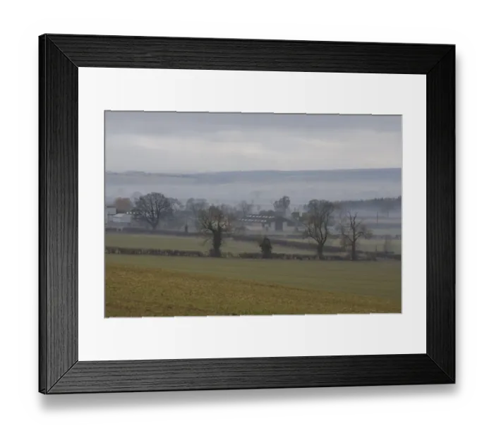 Framed Print : View of mist over fields and farm buildings, with low cloud over moorland in distance, North Yorkshire Moors Framed Print : View of mist over fields and farm buildings, with low cloud over moorland in distance, North Yorkshire Moors