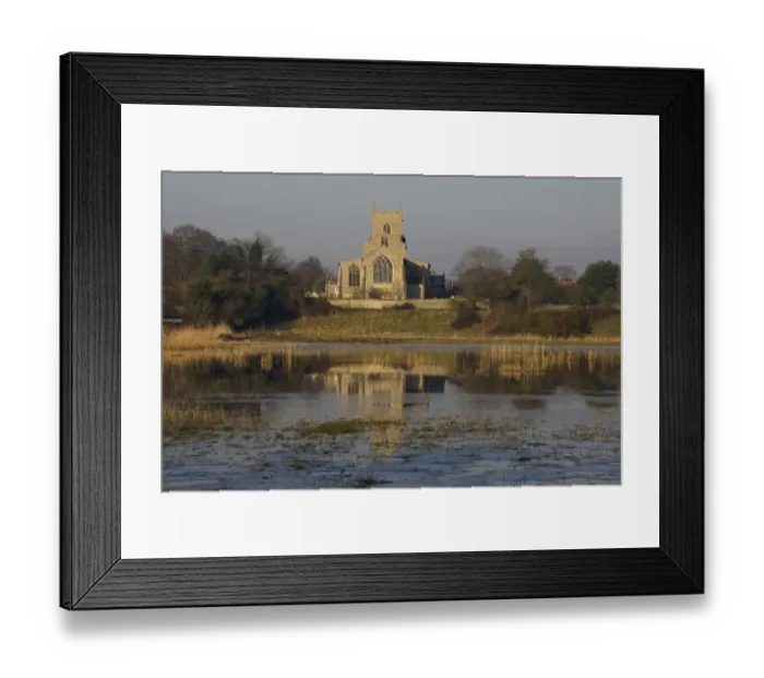 Framed Print : View across flooded grazing marsh towards church, St. Marys Church, Wiveton, Norfolk, England, march Framed Print : View across flooded grazing marsh towards church, St. Marys Church, Wiveton, Norfolk, England, march