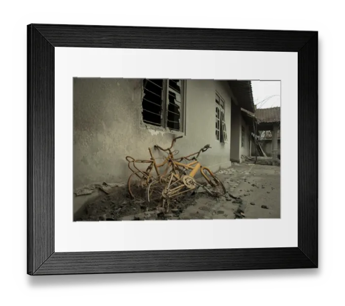 Framed Print : Ash, bikes and broken house windows, damaged from recent volcanic eruption, Kepuharjo, Mount Merapi, Central Java Framed Print : Ash, bikes and broken house windows, damaged from recent volcanic eruption, Kepuharjo, Mount Merapi, Central Java