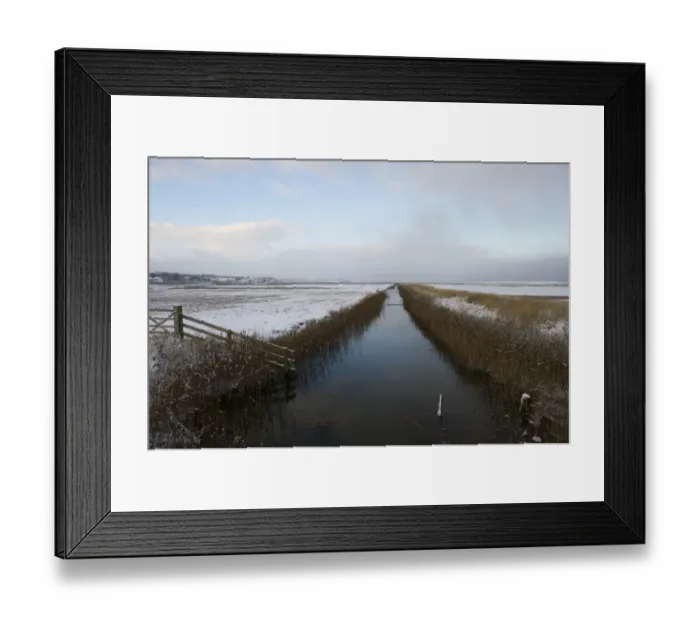 Framed Print : View of dyke and snow covered coastal grazing marsh habitat, Salthouse, Norfolk, England, december Framed Print : View of dyke and snow covered coastal grazing marsh habitat, Salthouse, Norfolk, England, december