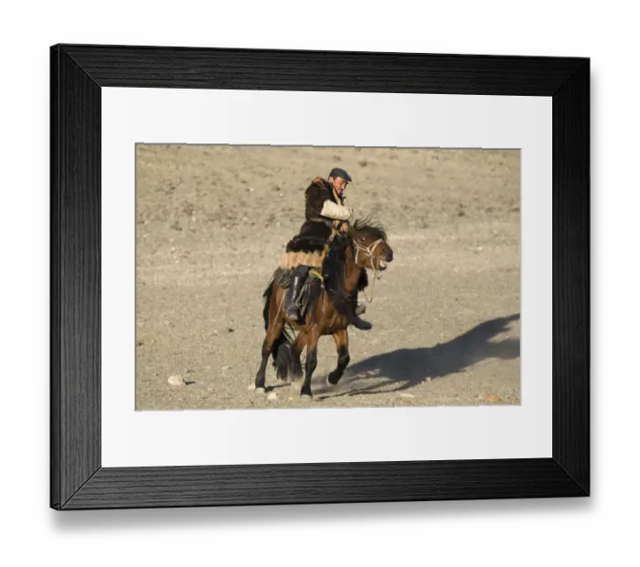 Framed Print : Kazakh nomad on horseback, riding on steppe, Altai Mountains, Bayan-Ulgii, Western Mongolia, october Framed Print : Kazakh nomad on horseback, riding on steppe, Altai Mountains, Bayan-Ulgii, Western Mongolia, october