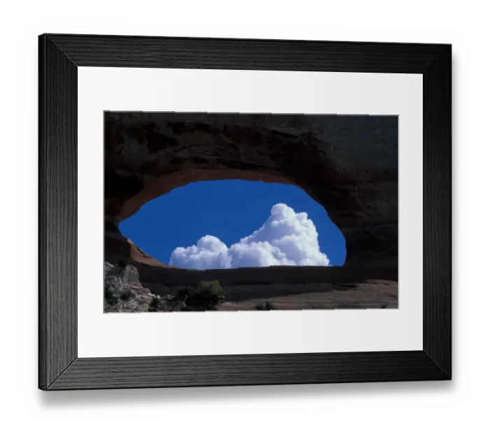Framed Print : Clouds - General Cloud formation through Wilson Arch - Utah, USA Framed Print : Clouds - General Cloud formation through Wilson Arch - Utah, USA