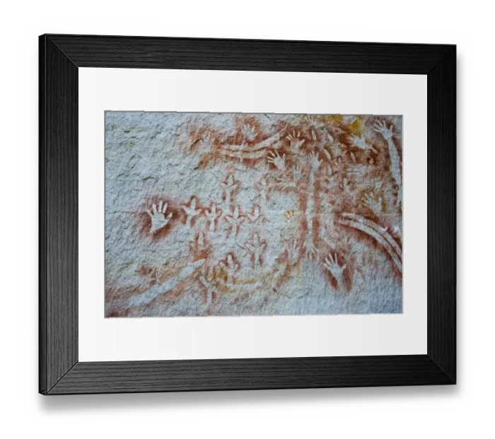 Framed Print : Aboriginal rock art, stencil art dated circa 2000 years old, showing depictions of hands, boomerangs Framed Print : Aboriginal rock art, stencil art dated circa 2000 years old, showing depictions of hands, boomerangs