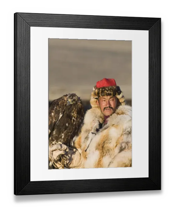 Framed Print : Kazakh hunter with Golden Eagle (Aquila chrysaetos), Altai Mountains, Bayan-Ulgii, Western Mongolia, october Framed Print : Kazakh hunter with Golden Eagle (Aquila chrysaetos), Altai Mountains, Bayan-Ulgii, Western Mongolia, october