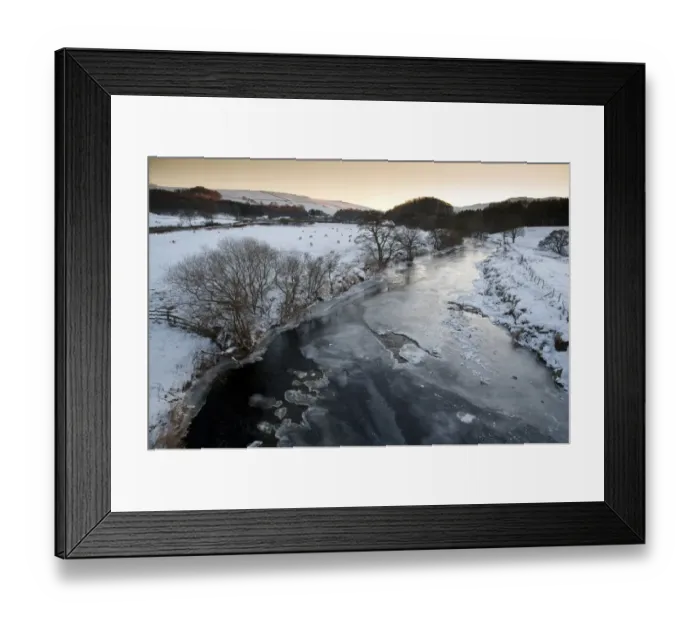 Framed Print : View of frozen river and snow covered pasture with sheep, River Hodder, from Burholme Bridge, Lancashire, England Framed Print : View of frozen river and snow covered pasture with sheep, River Hodder, from Burholme Bridge, Lancashire, England