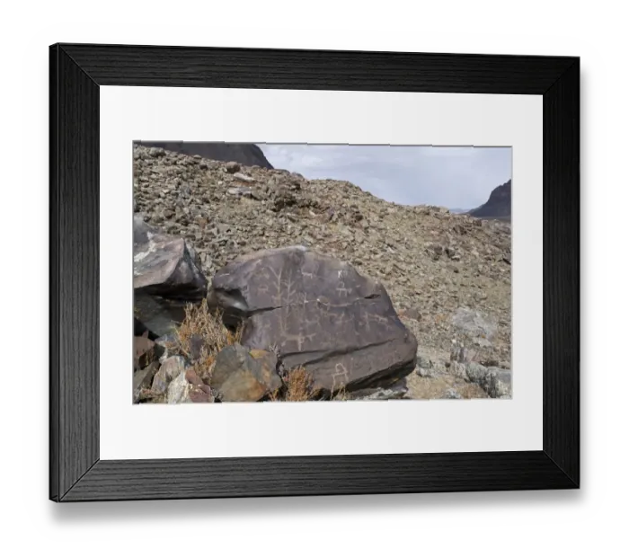 Framed Print : Ancient petroglyphs depicting animals and humans hunting, circa 400 A. D. High Altai, Bayan-Ulgii, Western Mongolia Framed Print : Ancient petroglyphs depicting animals and humans hunting, circa 400 A. D. High Altai, Bayan-Ulgii, Western Mongolia