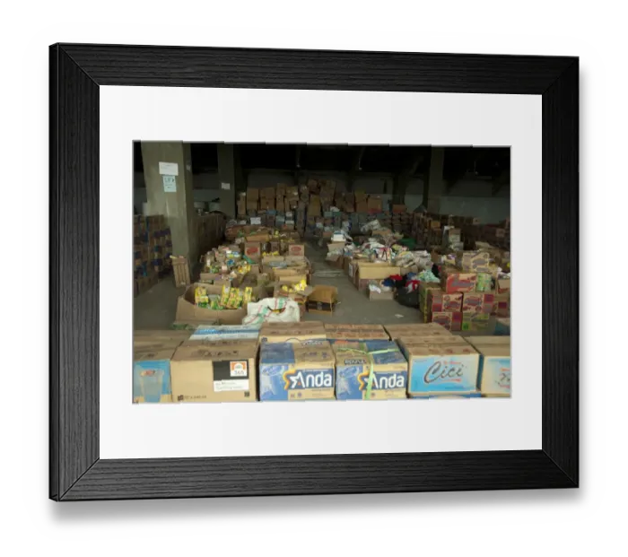 Framed Print : Boxes of supplies for refugees from recent volcanic eruption, Maguwo, Mount Merapi, Central Java, Indonesia Framed Print : Boxes of supplies for refugees from recent volcanic eruption, Maguwo, Mount Merapi, Central Java, Indonesia
