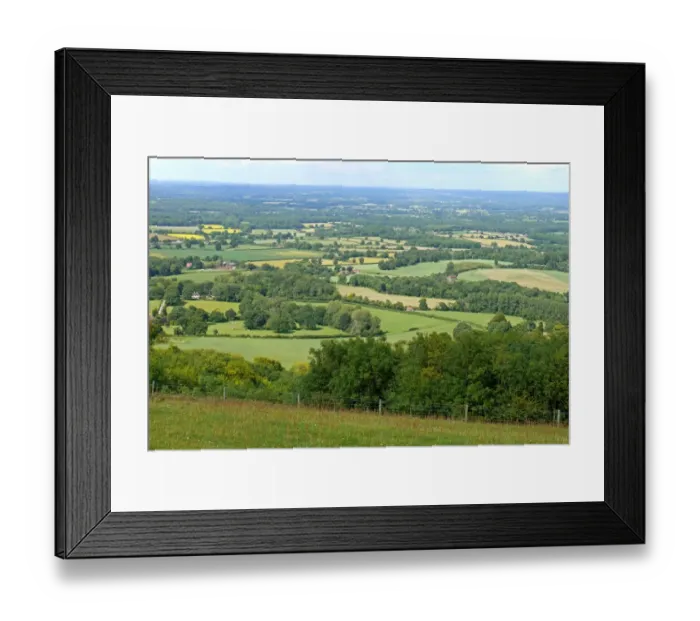 Framed Print : View of mixed farmland with hedgerows and scattered woodland, looking northeast from Chanctonbury Hill, The Weald Framed Print : View of mixed farmland with hedgerows and scattered woodland, looking northeast from Chanctonbury Hill, The Weald