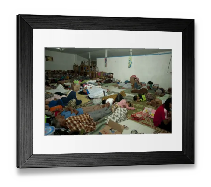 Framed Print : Refugees from recent volcanic eruption, sleeping in dormitory, near Jogyakarta, Mount Merapi, Central Java, Indonesia Framed Print : Refugees from recent volcanic eruption, sleeping in dormitory, near Jogyakarta, Mount Merapi, Central Java, Indonesia