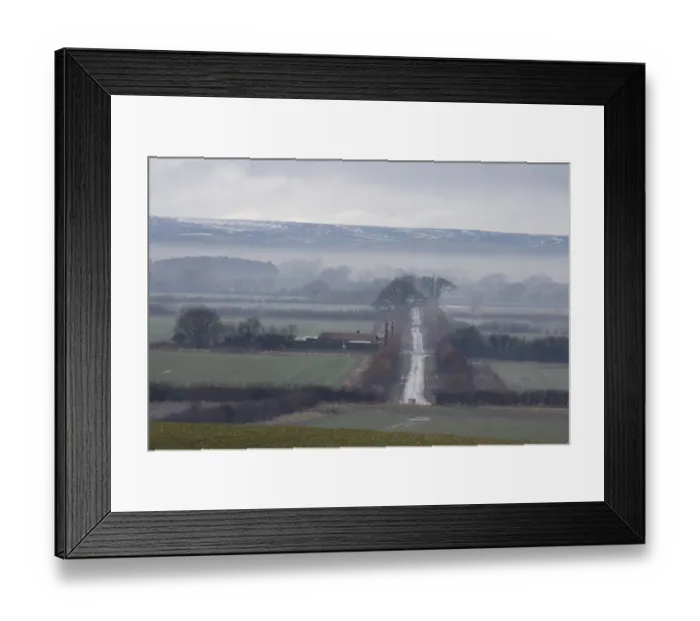 Framed Print : View of mist over fields and rural lane, with low cloud over moorland in distance, North Yorkshire Moors