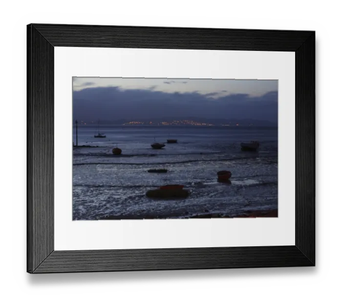 Framed Print : View of boats on intertidal mudflats habitat during low tide at night, looking towards Grange-over-sands in Cumbria Framed Print : View of boats on intertidal mudflats habitat during low tide at night, looking towards Grange-over-sands in Cumbria